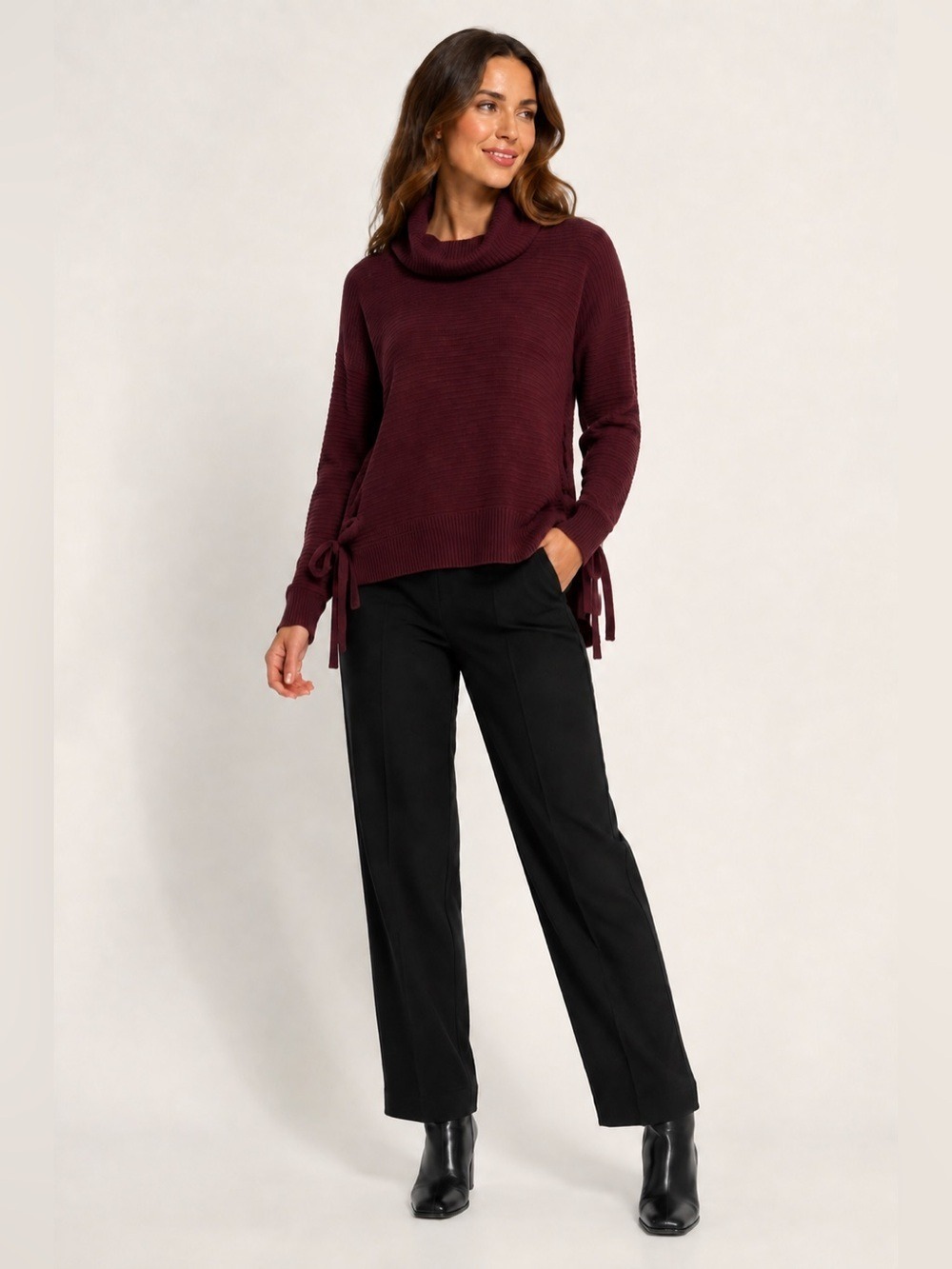 Women’s burgundy ribbed sweater with side ties. Size L
